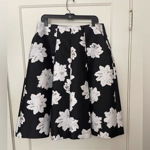 Lane Bryant pleated, shiny A-line skirt.